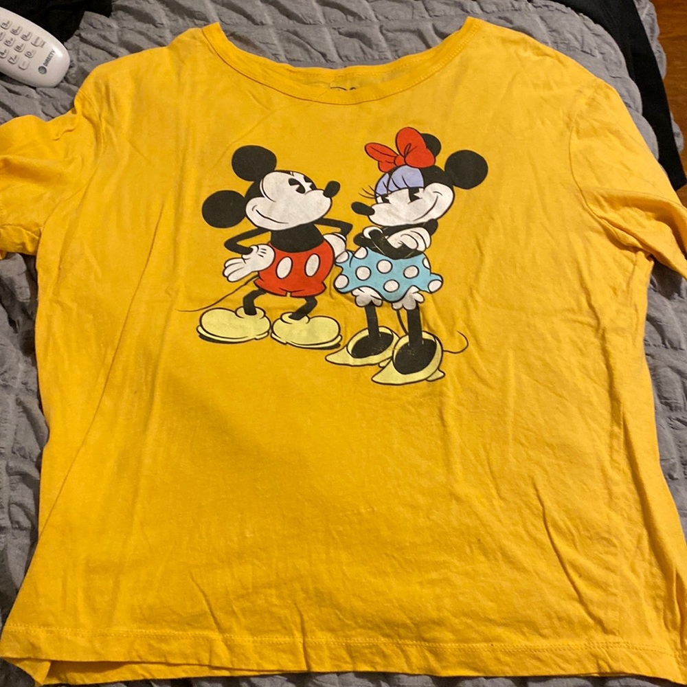 Disney Mickey and Minnie shirt that fits like a medium but is a large